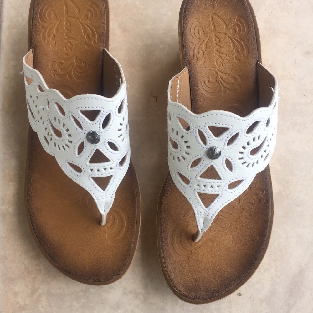 Brand new Clark sandals pd $150.